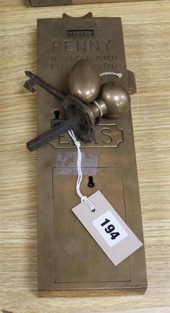 An Etas No. 11 brass Penny in the Slot door lock with key and handle